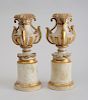 PAIR OF ITALIAN CARVED, PAINTED AND PARCEL-GILT STANDS