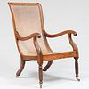 Anglo-Indian Carved Hardwood and Caned Armchair