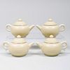 Set of Four Miniature Heian Tamba Yellow Glazed Porcelain Teapots and Covers