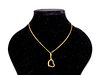 14kt Yellow Gold Necklace With a Heart Shaped Center Pendent & 10kt Yellow Gold Charm