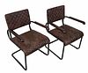 FOUR FERMO VINTAGE BROWN ARMCHAIRS