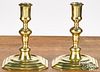 Pair of English William and Mary brass candlestick