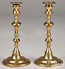 Pair of tall English bell metal candlesticks