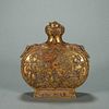 A dragon patterned gold flask
