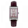 BULGARI - a lady's Rettangolo wrist watch. Stainless steel case with a row of factory set pink stone