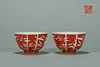 A pair of iron red ground white bamboo porcelain cups