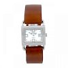 HERMES - a lady's Barenia wrist watch. Stainless steel case. Reference BA1.210, serial 2457291. Sign