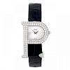 PIAGET - a lady's wrist watch. Factory diamond set 18ct white gold case in the shape of a 'P' with h