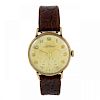 OLLIVANT & BOTSFORD - a gentleman's wrist watch. 9ct yellow gold case, hallmarked Birmingham 1954. N