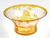 A Bohemian amber-flashed glass bowl of flared form, having acid-etched yellow overlay decoration, de