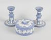 Two boxes of Wedgwood blue jasperware items, to include various shaped lidded boxes, candlesticks, b