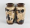 A large pair of Bretby pottery vases, each of slight tapering hexagonal form below a greek key neck,