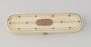 An early 19th century rose gold-inlaid ivory toothpick box. Of rounded oblong form, the hinged cover