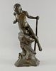 Dominico Jollo, Italian, 1866-1938   Bronze figure young boy perched on a rock, signed, 45 cm high