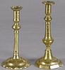 Two English brass candlesticks, 18th c., 9'' h. and 9 3/4'' h.