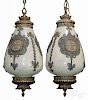 Pair of iridescent glass hanging lights with brass mounts, 21'' h.