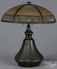 Patinated bronze table lamp, early 20th c., with a reverse painted shade, 22'' h.