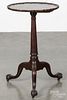 George III mahogany candlestand, ca. 1770, with a piecrust top and ball and claw feet, 27 1/4'' h.