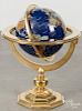 Brass globe with gemstone inlays, 26'' h.