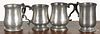 Four pewter mugs, 19th c., one inscribed A. W. McKenzie, tallest - 5 1/4''.
