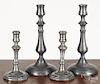 Two pairs of pewter candlesticks, 19th c., 10 3/4'' h. and 7 1/4'' h.