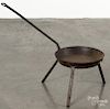 Wrought iron tripod skillet, 19th c., stamped Foster, 28 1/2'' l.