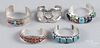 Five Navajo silver, turquoise, and hardstone cuff bracelets.