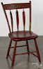 Painted arrowback chair, ca. 1840, retaining an old red surface.