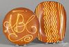 Greg Shooner, redware loaf dish, 9 3/4'' h., 12 1/4'' w., together with an ABC plate, 10 3/4'' dia.