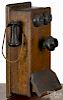 Western Electric oak wall telephone, early 20th c., 20 1/4'' h., 9 1/4'' w.