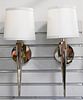 Pair of Donghia Pacific Heights Wall Sconces, in polished nickel finish, height 19 1/2 inches, retails for $3,400, sold with original purchase receipt