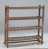 French Provincial Carved Pine Drying Rack, 19th c., with four galleried plank shelves on block feet, joined by rectangular stretchers, H.- 49 3/4 in.,