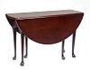 English Carved Mahogany Queen Anne Style Dropleaf Gateleg Dining Table, early 20th c., the circular top over one end drawer, on Queen Anne legs with p
