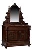 French Henri II Style Carved Walnut Marble Top Dresser, c. 1880, the arched wide beveled mirror with a pierced ribbon crest, flanked by graduated cand
