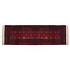 TAPETE. SXX. Estilo BOKHARA, lana y algodón, anudado semimecanizado, diseños geométricos, en tono rojo y gris. 222 x 71 cm aprox.