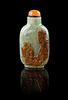 * A Carved Celadon Jade Snuff Bottle Height 2 3/4 inches.