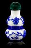 A Blue Overlay White Peking Glass Snuff Bottle Height 3 inches.