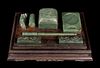 * A Set of Chinese Spinach Jade Writing Implements Height overall 5 7/8 inches.