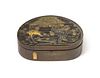 A Gilt Decorated Bronze Pill Box and Cover Length 2 1/2 inches.