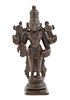 * An Indian Bronze Figure of a Standing Deity Height 4 inches.