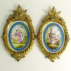 Pair of Vintage Sevres Style Hand Painted Porcelain Plaques in Carved Giltwood Frames.