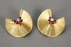 Pair of Tiffany 14K gold fan style clip on earrings set with small diamond surrounded by rubies. 9.5 grams