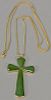 Green jade cross mounted in 14K gold on 18K gold chain. lg. 31 in.; 9.7 grams of 18K gold