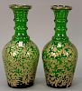 Pair of large green glass decanters decorated with heavy raised gilt decorated scrolling leaves, possibly Moser.
ht. 14 in.