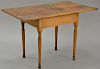 Queen Anne center table having breadboard top on plain frieze on turned legs, 18th century (original top). 
ht. 27 in.; top: 24 3/4"...