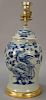Large blue and white phoenix bird jar having celadon ground with painted phoenix bird amongst blossoming flowers made into a table l...