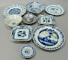Eleven pieces of blue and white Korean and Oriental plates and dishes to include three plates, two square dishes, snuff bottle, two ...