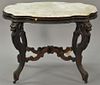 Victorian walnut marble top center table with shaped marble top. 
ht. 30 in.; top: 28" x 39"