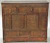 Oriental three drawer over two door cabinet, front having pressed floral decoration. 
ht. 35 1/2 in.; wd. 40 1/2 in.; dp. 15 in.