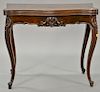 Victorian rosewood game table with cabriole legs and carved shell front having top opening to reveal felt interior. ht. 29 1/2 in.;...